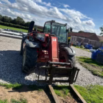Manitou with pallet fork attachment