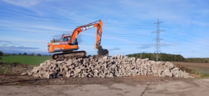 14 Tonne Crusher Bucket on stone pile