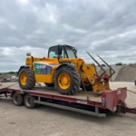Low Loader trailer with forklift on