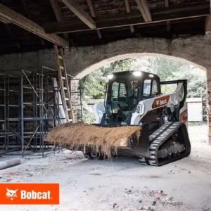 Bobcat T76 Compact Track Loader - Skid Steer - Full bucket entering building